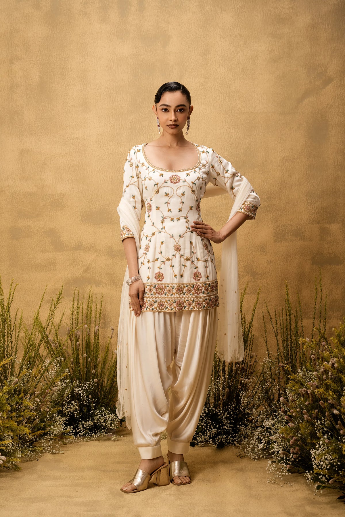 Ivory hand embroidered modal satin suit set with net dupatta