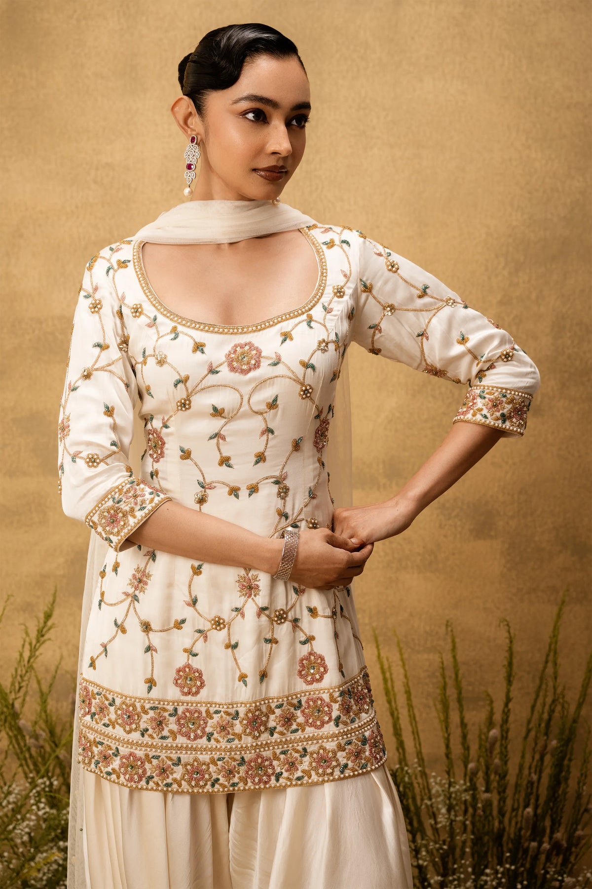 Ivory hand embroidered modal satin suit set with net dupatta