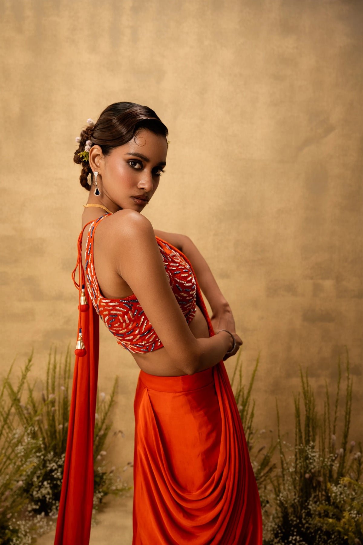 Bright Orange pre-draped modal satin saree with embroidered blouse