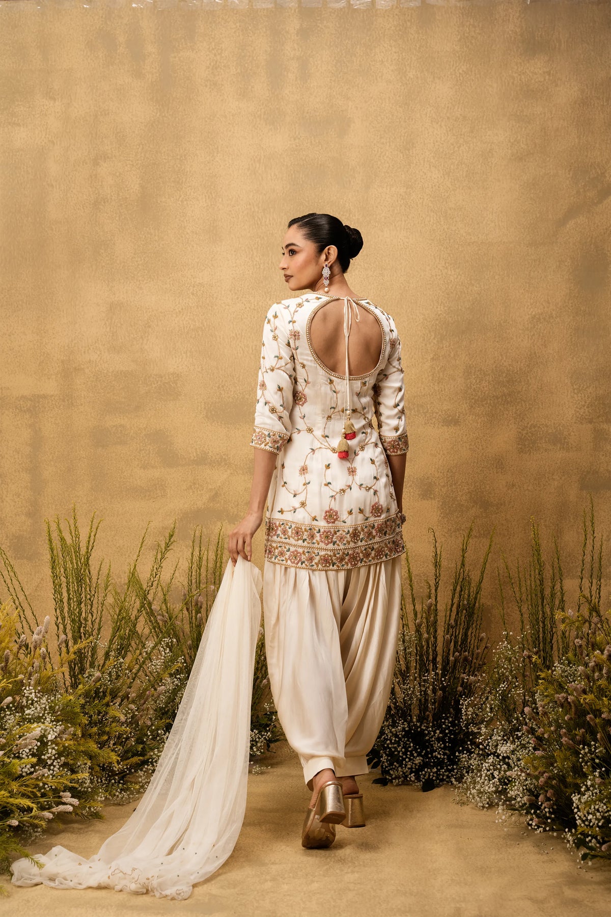 Ivory hand embroidered modal satin suit set with net dupatta