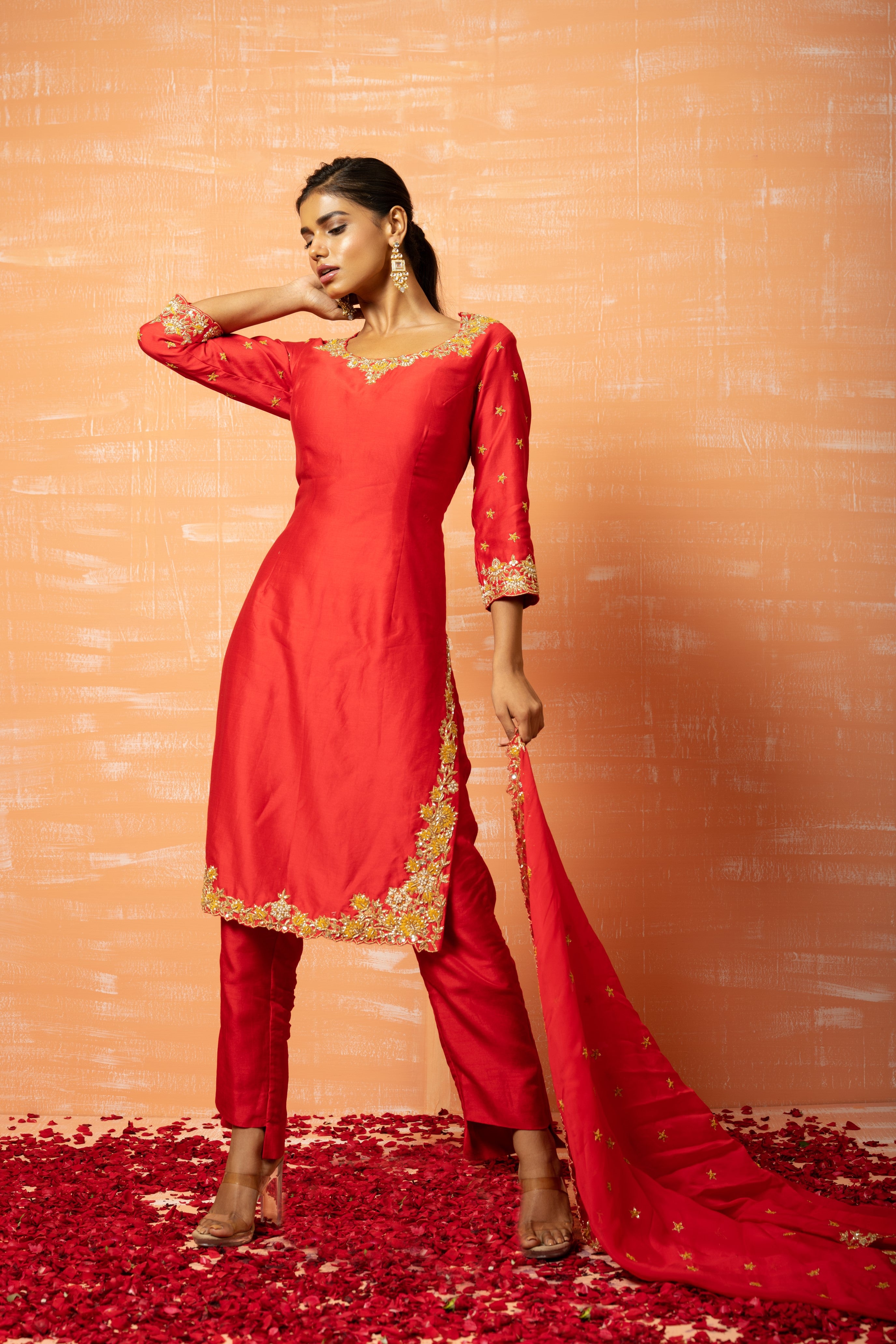 Red chanderi silk kurta set with hand-embroidered organza dupatta.