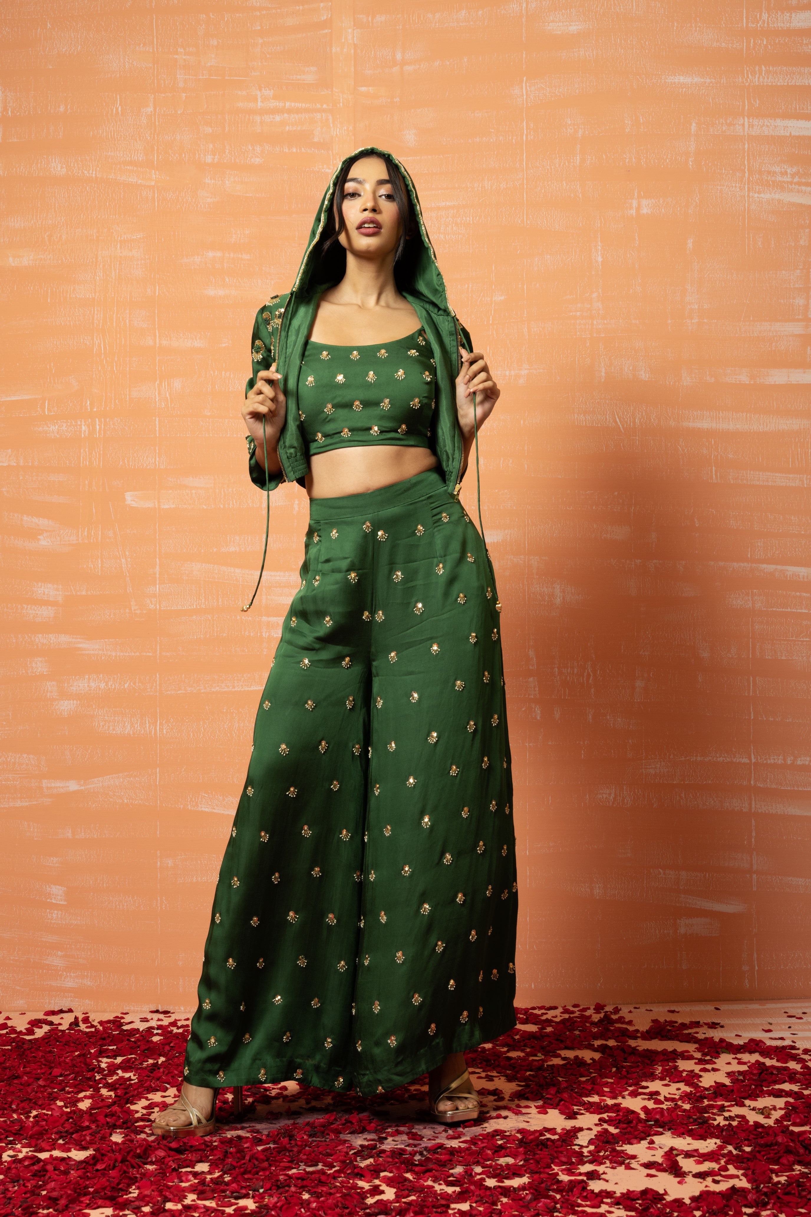Mehendi green hoodie and palazzo set with hand embroidery.