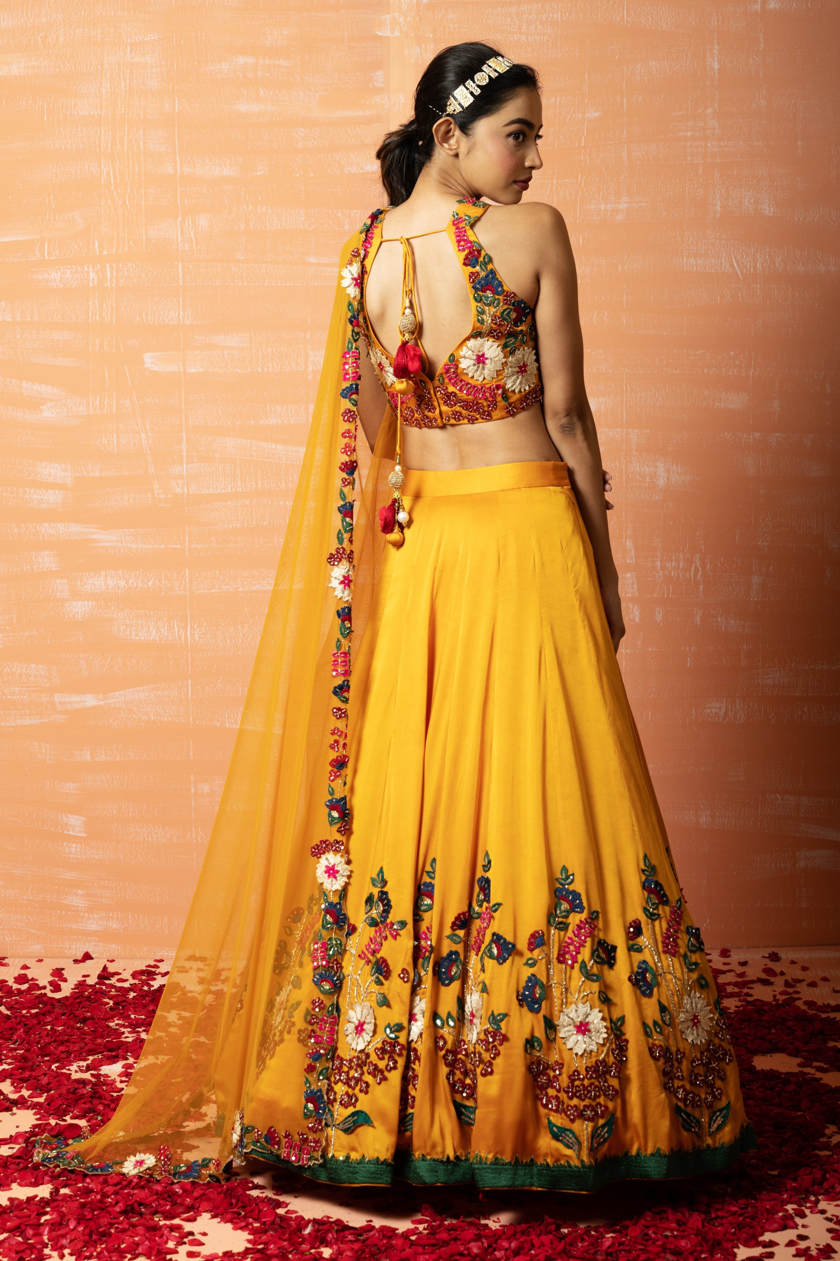 Mustard yellow 3D lehenga set with applique embroidery and matching embroidered dupatta.