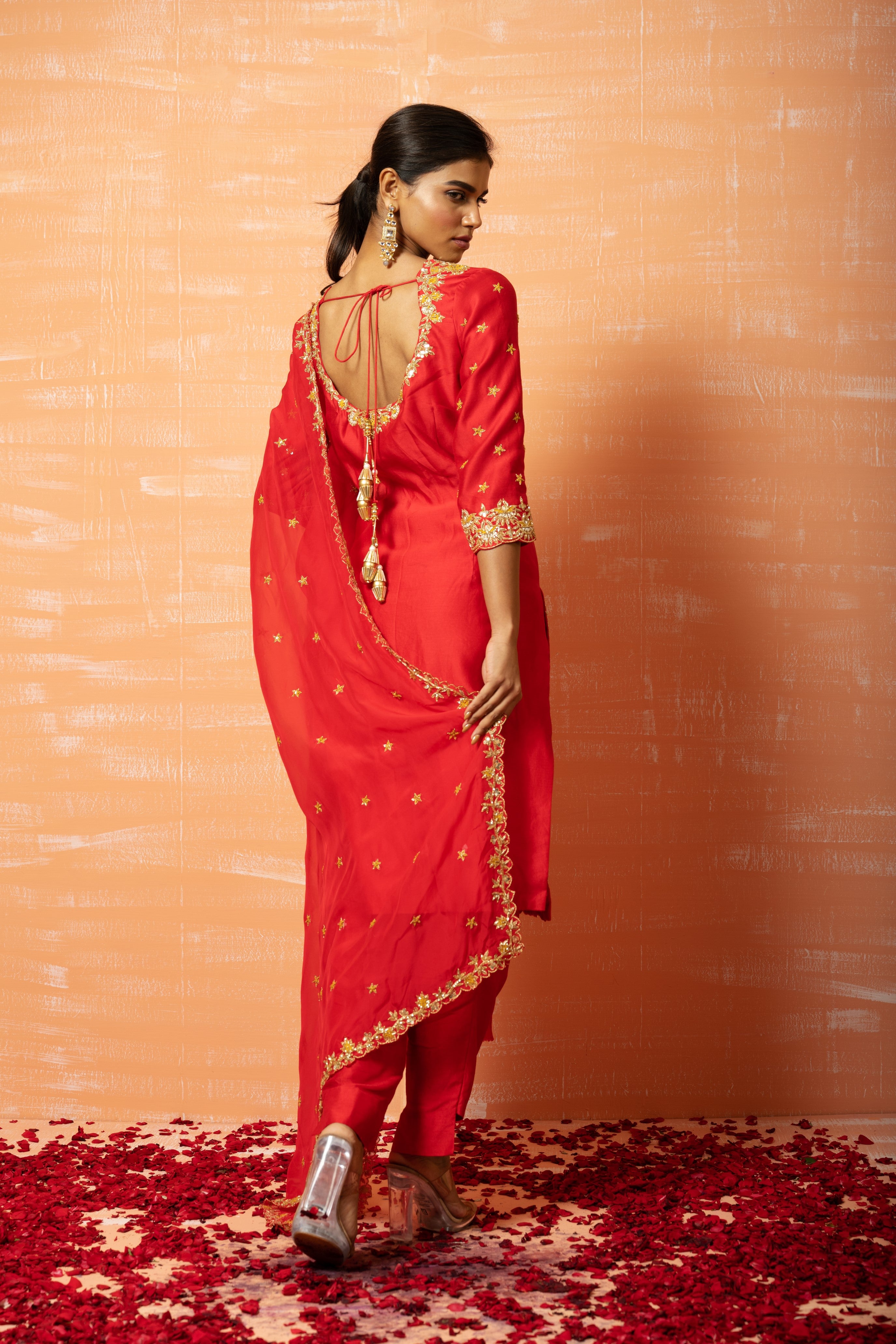 Red chanderi silk kurta set with hand-embroidered organza dupatta.