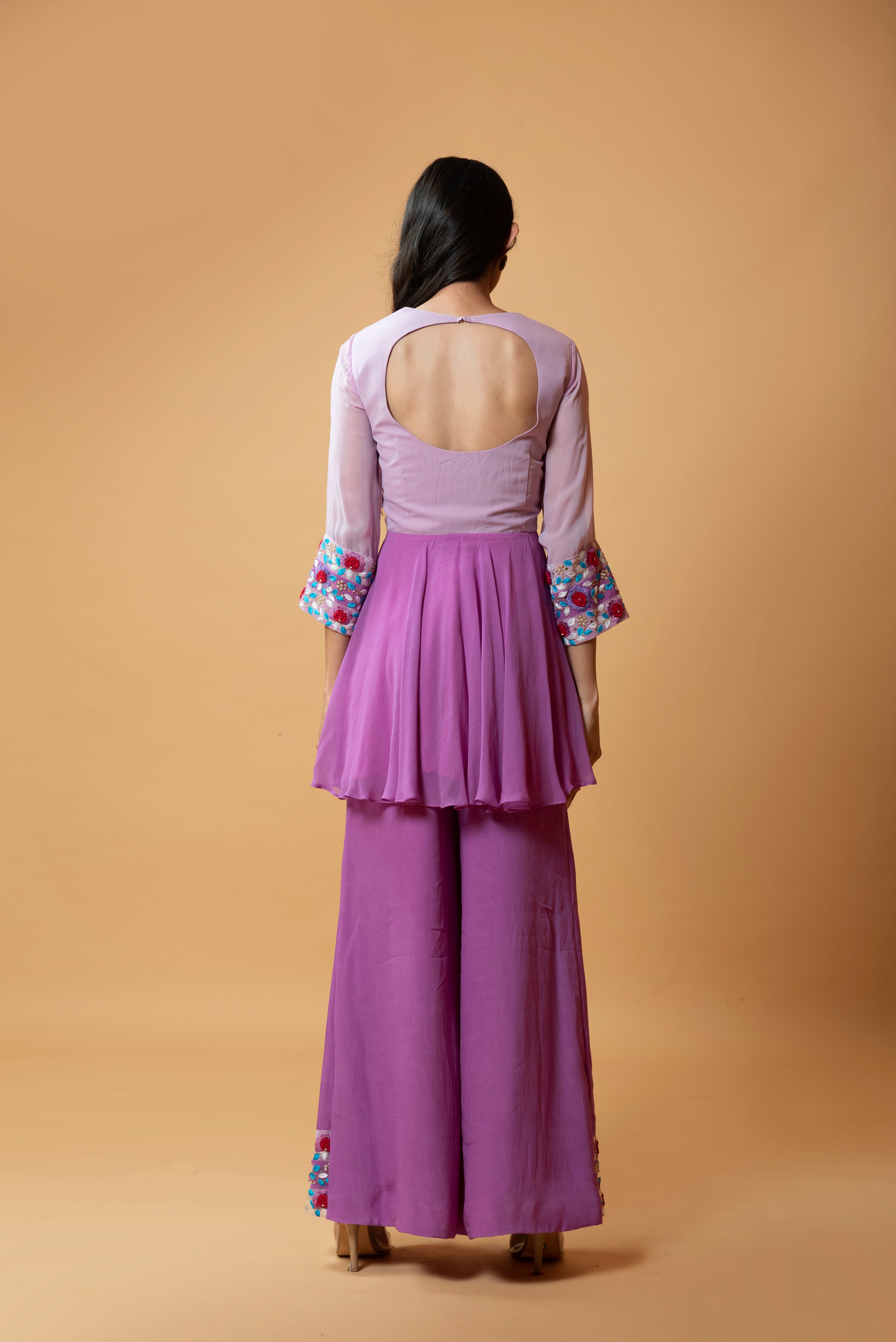 Lavender double-shaded sharara set with intricate floral embroidery.