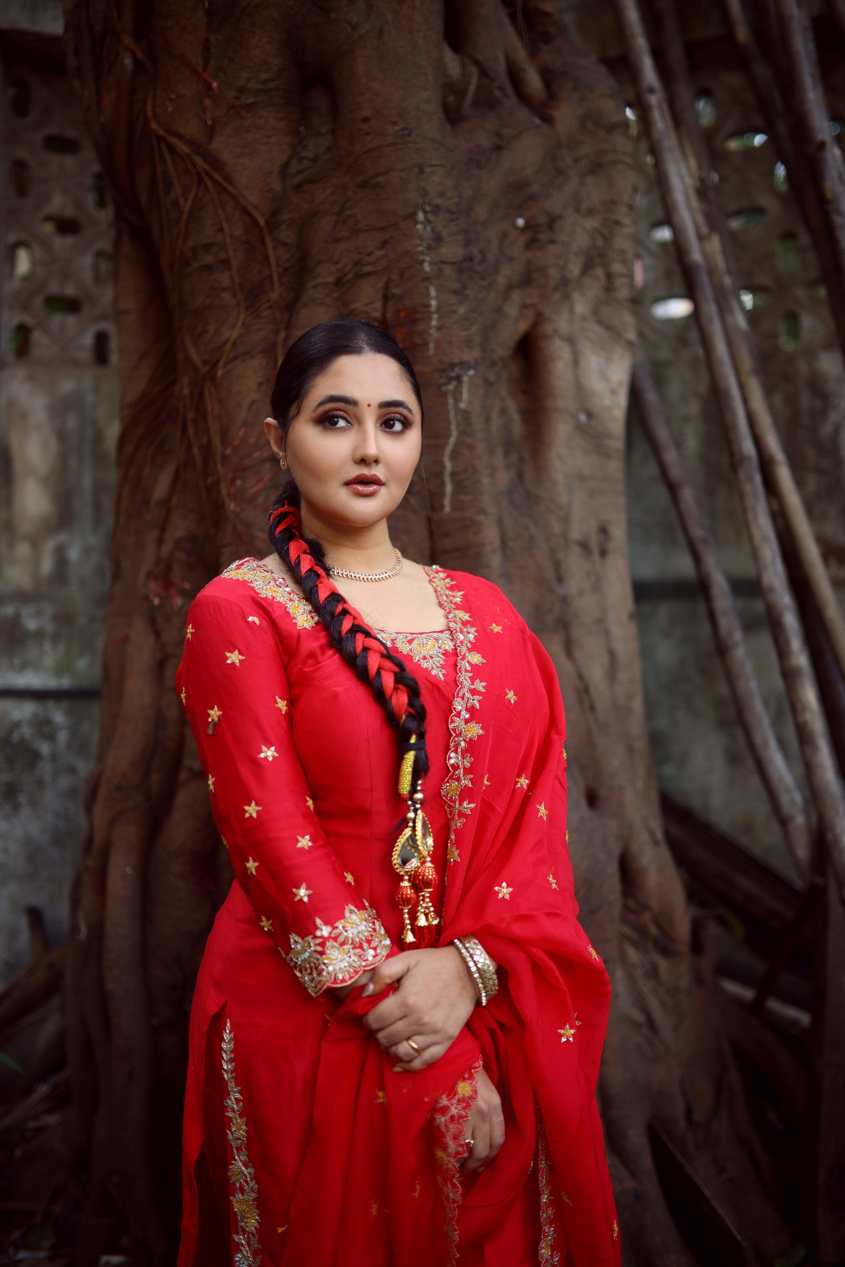 Rashami Desai in a red chanderi silk kurta set with hand-embroidered organza dupatta.