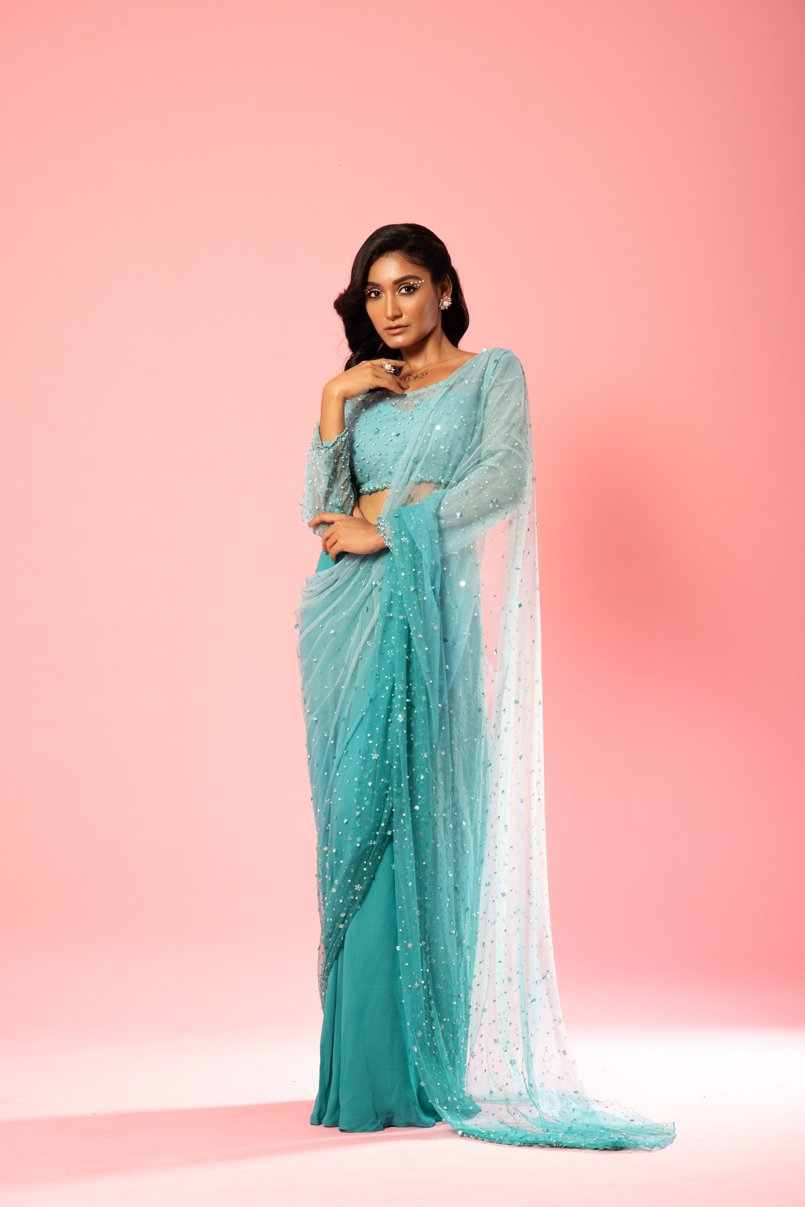 Teal and powder blue ombre pre-stitched saree with hand-embroidered blouse and pallu.
