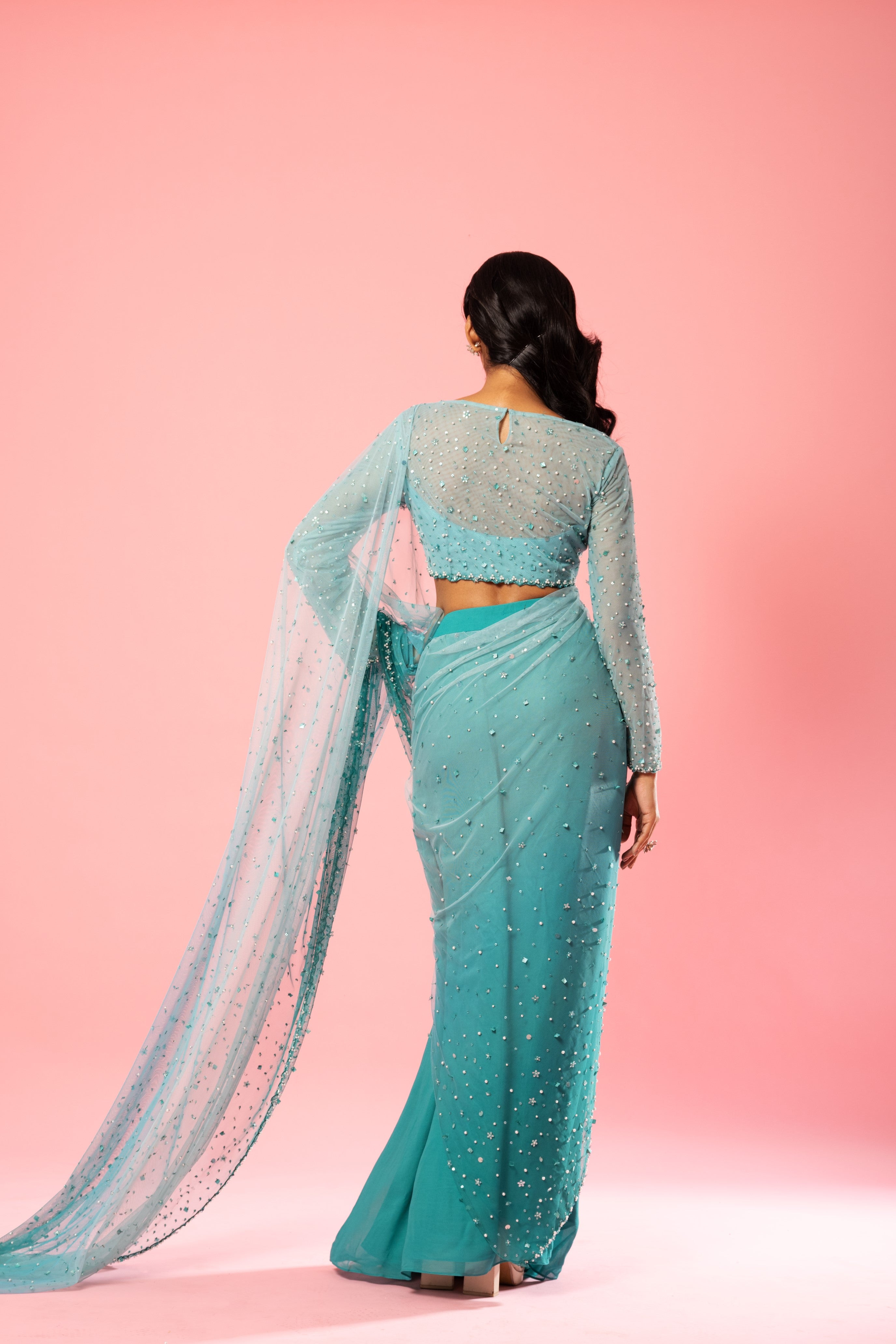 Teal and powder blue ombre pre-stitched saree with hand-embroidered blouse and pallu.