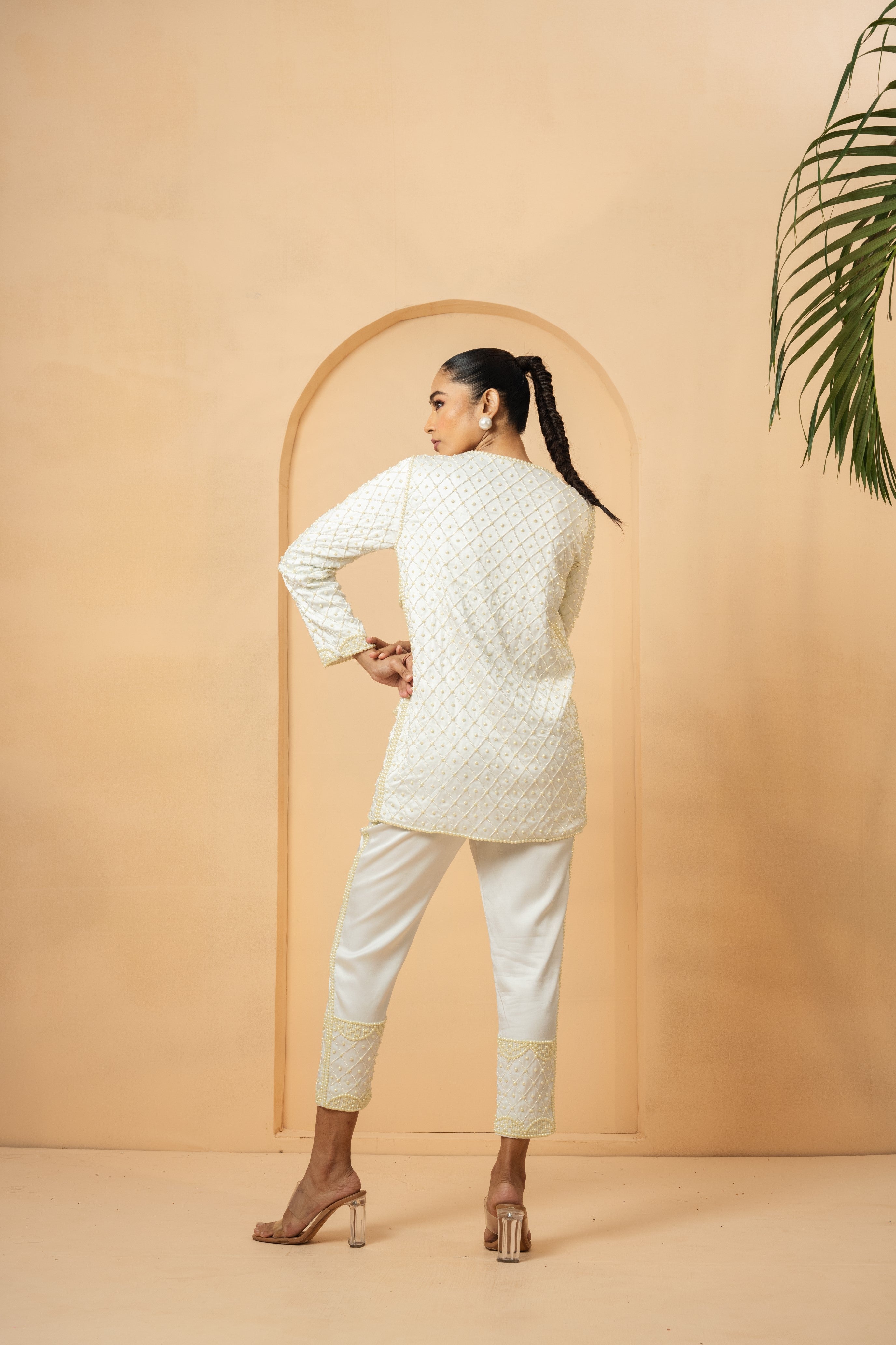 Ivory co-ord set with hand-embroidered blazer and trousers.