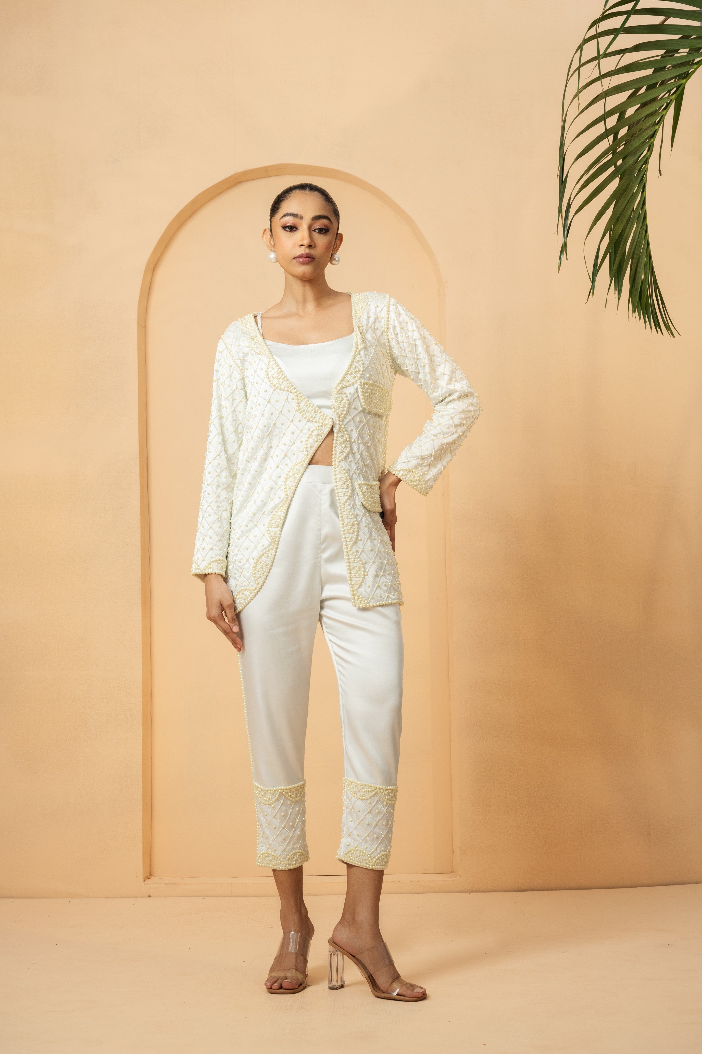 Ivory co-ord set with hand-embroidered blazer and trousers.