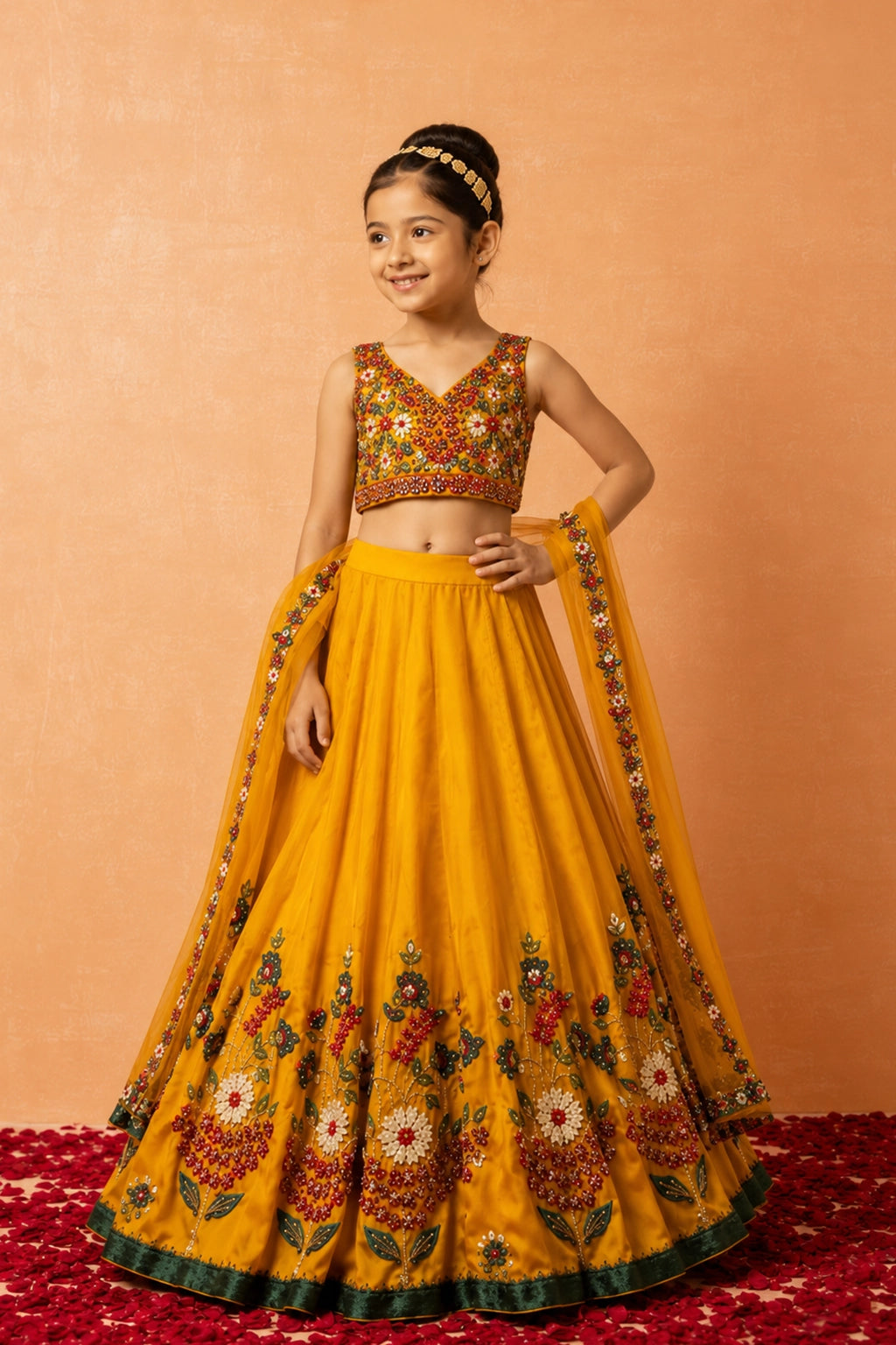 Mustard yellow lehenga crafted from modal silk with intricate 3d applique embroidery. Paired with a matching embroidered dupatta in soft net.