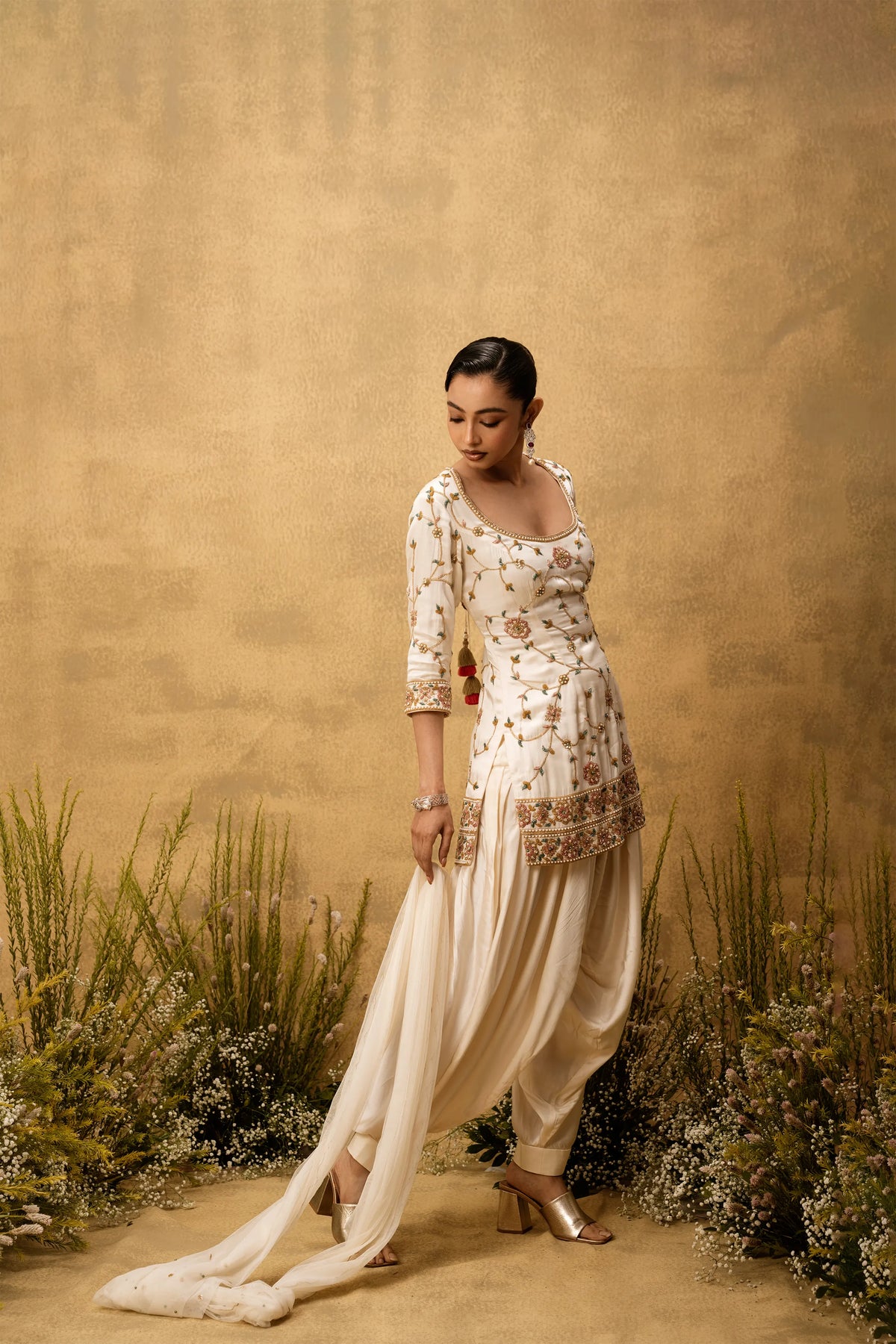 Ivory hand embroidered modal satin suit set with net dupatta