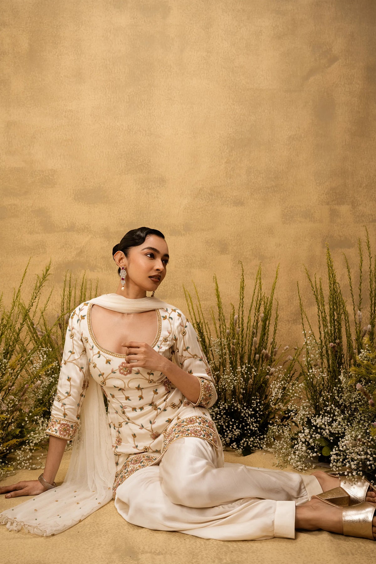 Ivory hand embroidered modal satin suit set with net dupatta