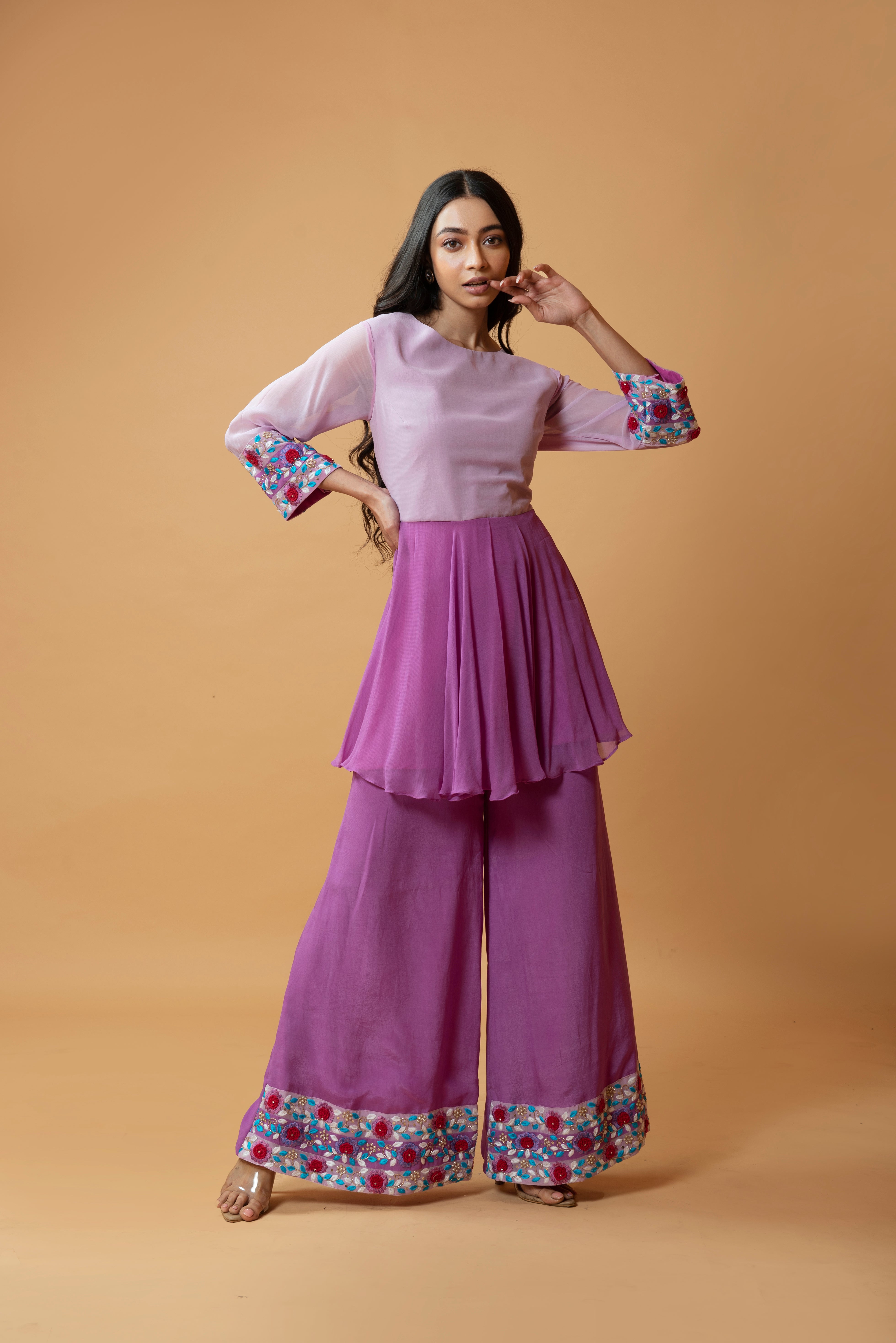 Lavender double-shaded sharara set with intricate floral embroidery.