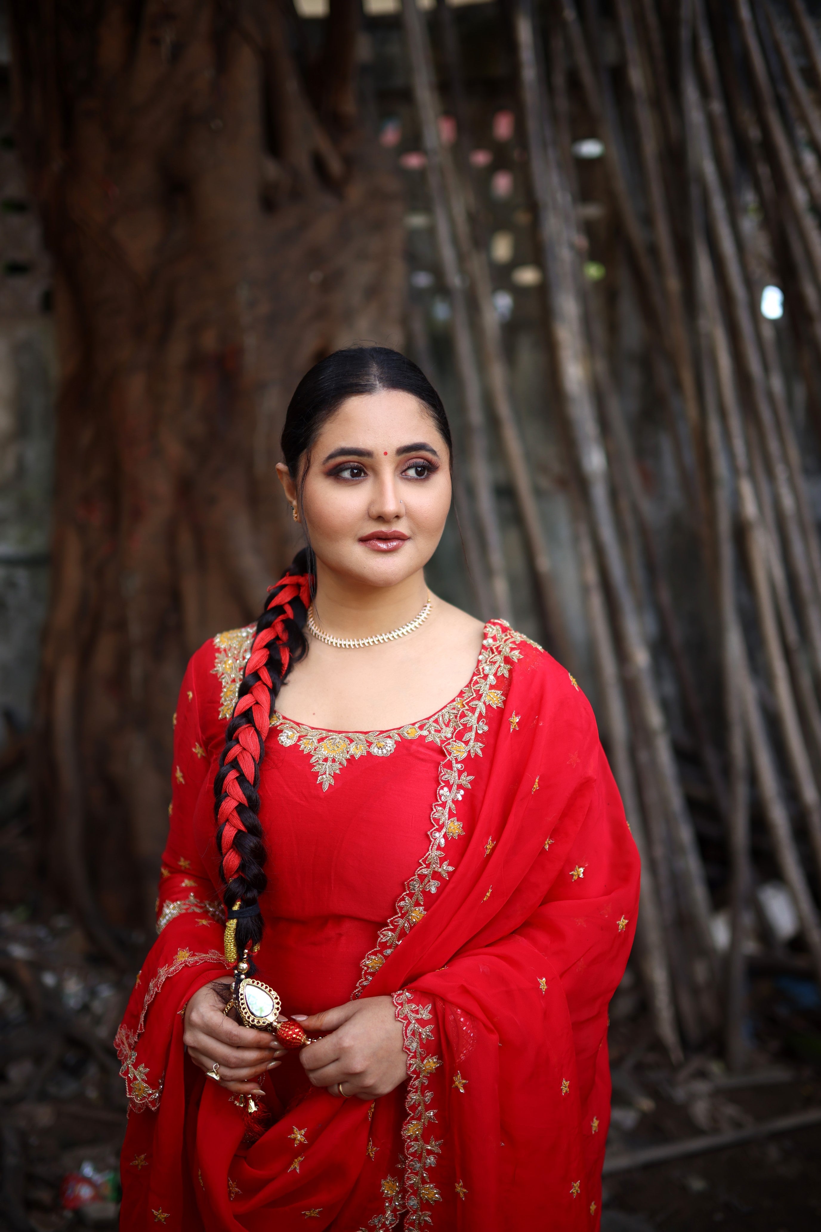 Rashami Desai in a red chanderi silk kurta set with hand-embroidered organza dupatta.