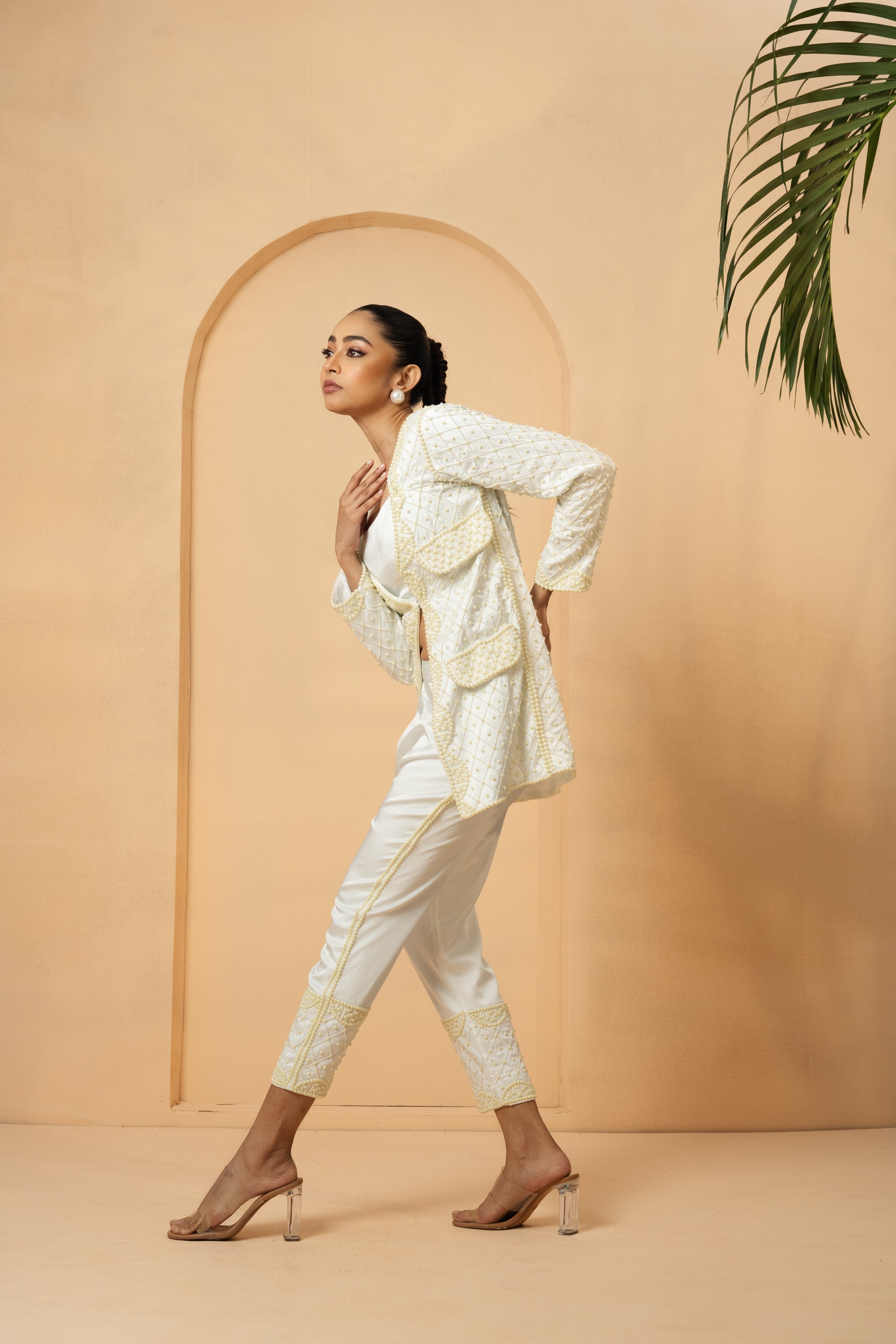 Ivory co-ord set with hand-embroidered blazer and trousers.